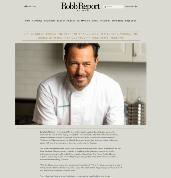 Chef Eric Ripert in a white kitchen coat featured in The Robb Report.